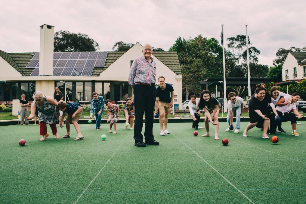 President of Canberra Bowling Club, Geoff McKay, with patrons on Sunday. Photo: Jamila Toderas