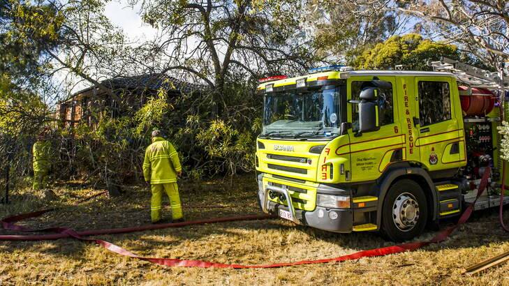 ACT Firefighters work to bring a house fire under control in Spence earlier in May. Photo: Rohan Thomson