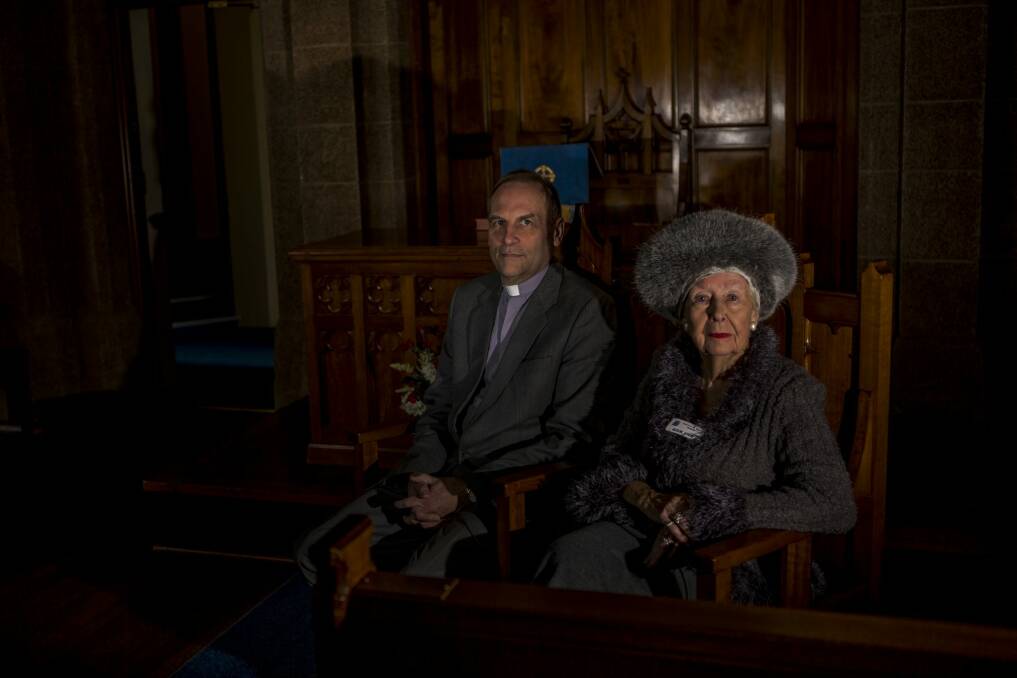 Senior Minister of St Andrew's Presbyterian Church Canberra David Campbell, and parishioner Alison Aitken seated at the  Warrior's Chapel at the Presbyterian Church of St Andrew in Forrest.


 Photo: Jamila Toderas