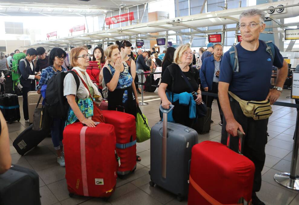 Leaked emails show the Australian Border Force is slashing casual staff at airports in the busy Christmas period. Photo: AAP