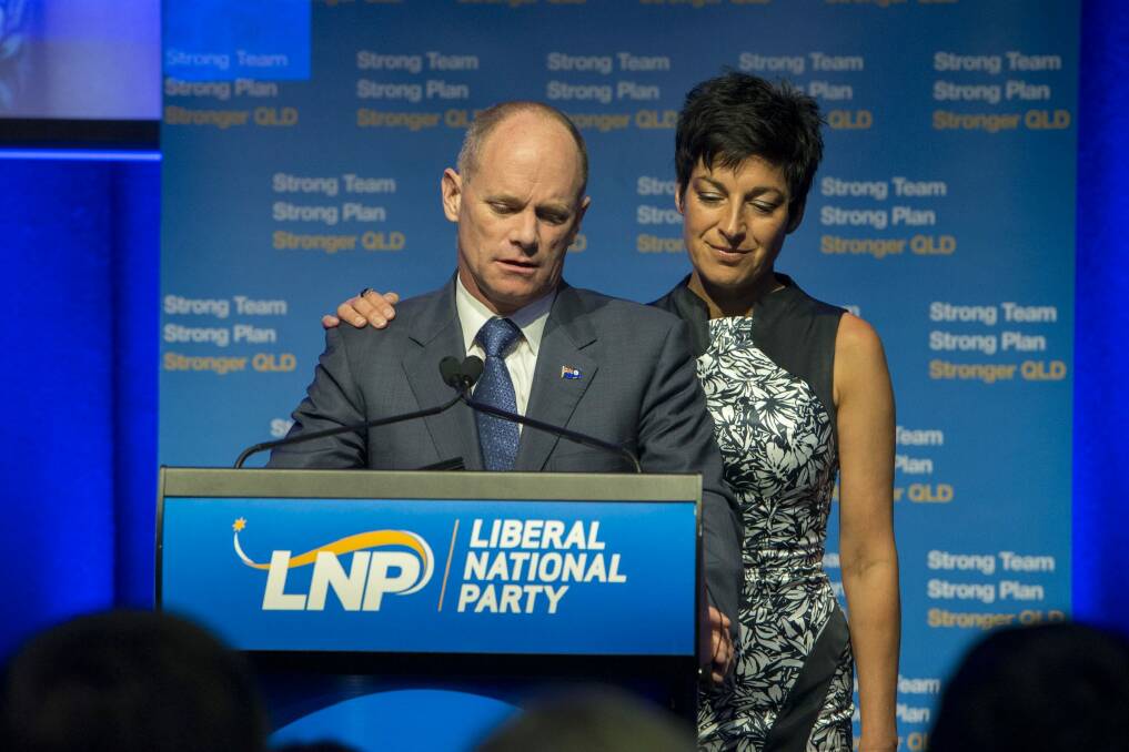 Campbell Newman and his wife Lisa address LNP supporters on election night. The Queensland premier lost his seat and his part lost government. Photo: Glenn Hunt