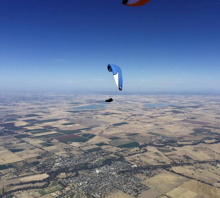 Kari Roberson gliding over  Rochester, Victoria, with Greens Lake and Lake Cooper in the background. Photo: Supplied