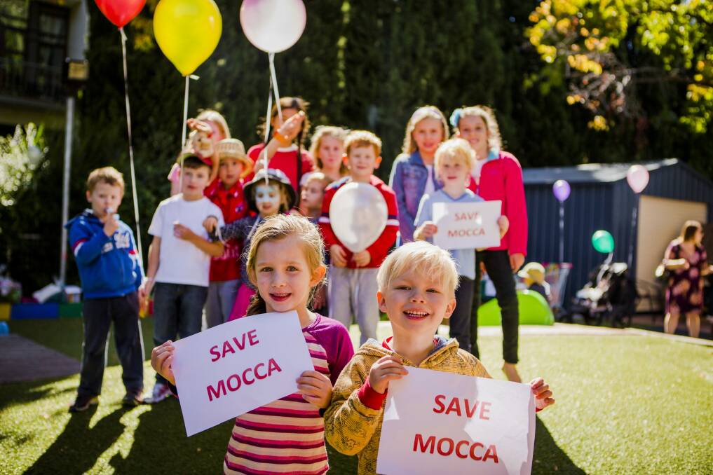 Hannah Claudianos, five, and Jack Rochester, three, join their fellow students to protest the closure of MOCCA. Photo: Jamila Toderas