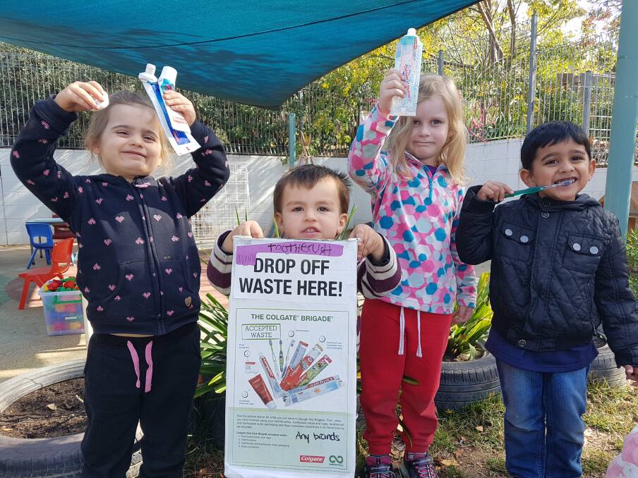 Children from the CSIROCare Black Mountain Early Childhood Centre are asking you to donate your old oral hygiene products so they might win a garden for the centre.  Photo: Supplied 