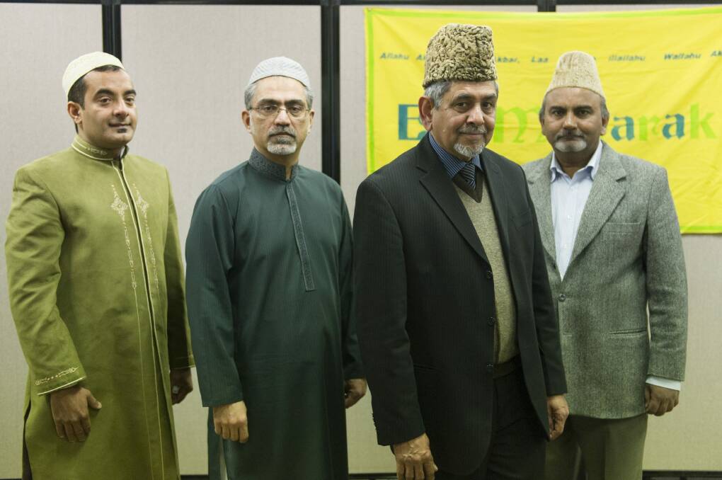 Kamran Ahmed, Khalid Syed, Imam Masood Shahid and Abdul Latif after the Eid celebration at the Ahmadiyya Muslim prayer centre in Fyshwick.
 Photo: Jay Cronan