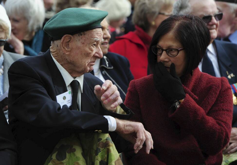 Veteran Ted Dubberlin chats with Loretta Sayer at the Australian War Memorial on Monday. Photo: Graham Tidy