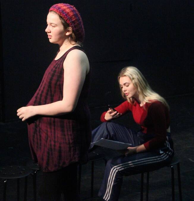 From left, Kiah Zeller and Elektra Spencer in Versions of Us. Photo: Canberra Youth Theatre