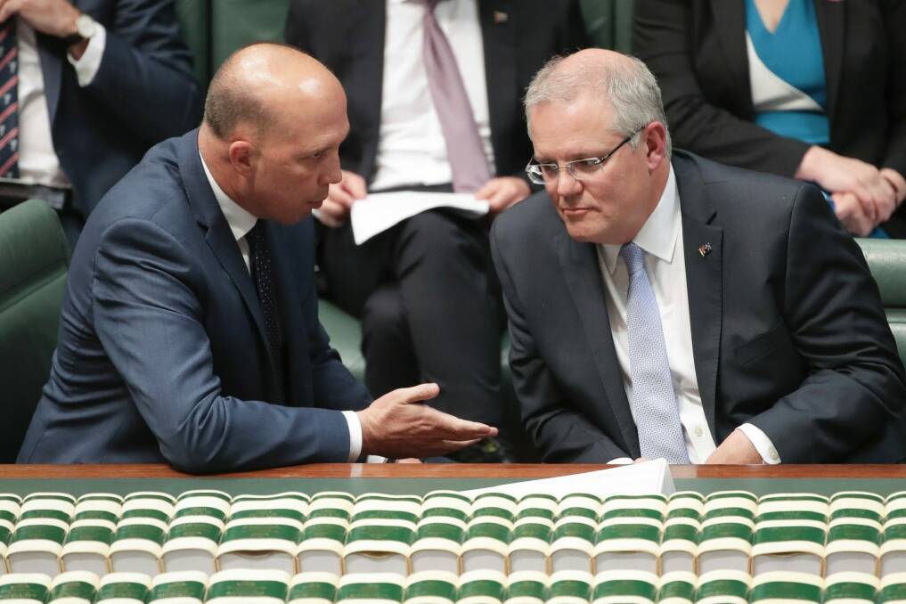 Home Affairs Minister Peter Dutton and Prime Minister Scott Morrison during question time in October. Photo: Alex Ellinghausen