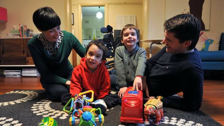DETERMINATION: From left, mum Fiona Keary, Max, 3, who has severe cerebral palsy, his brother Oscar, 4, and dad Geoff Howell; below, Luke Kennedy from The Voice. Photo: Graham Tidy