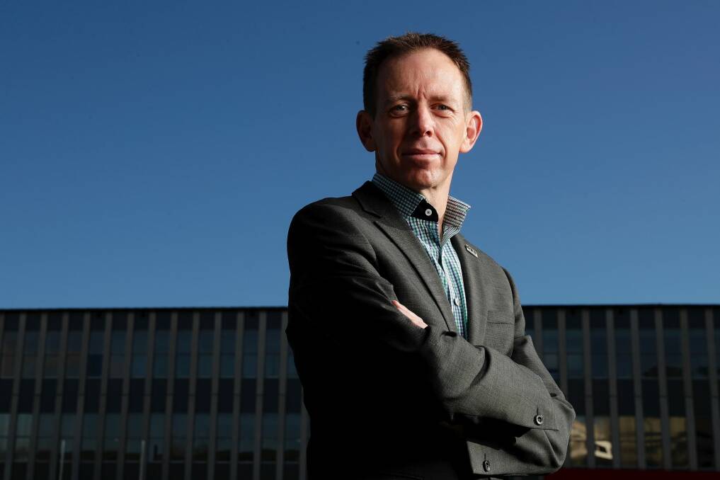 Climate Change Minister Shane Rattenbury says the cost of failing to tackle climate change will be far greater. Photo: Alex Ellinghausen