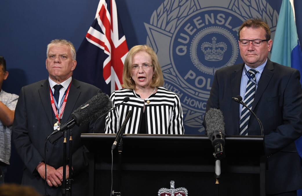 Detective Superintendent Jon Wacker, Queensland chief health officer Jeanette Young and Acting Chief Superintendent of state crime command Terry Lawrence at a press conference at Police headquarters in Brisbane. Photo: AAP