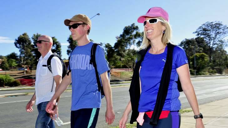 Chief Minister Katy Gallagher tackles another section of the Centenary trail with her advisors Vic Smorhun and Stephen Paillas. Photo: Melissa Adams
