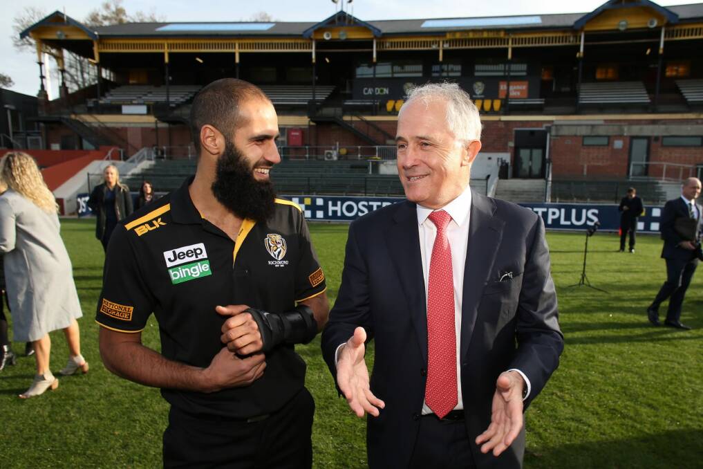 Prime Minister Malcolm Turnbull met with Richmond AFL player Bachar Houli and aspiring players at the Richmond Football Club on Wednesday. Photo: Andrew Meares