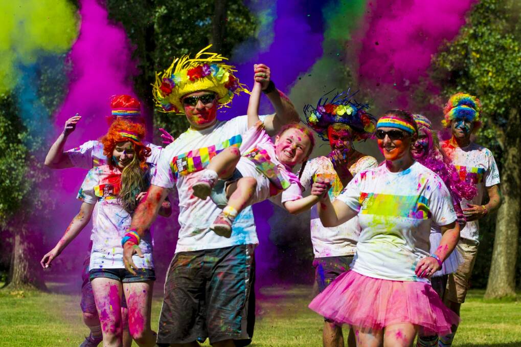 Aleksi Roberts, Katie Dougherty, James Wiltshire, Sierra Wiltshire, 4, Melissa Wiltshire,   Pauly Gibbons, Charlotte Cuttle and Tom Scrutton getting ready for the Colour Run on Sunday.  Photo: Jay Cronan