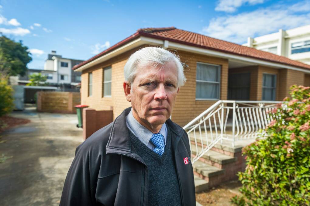 Real-estate agent David Whittem, who says it is unbelievable that the owner of this Turner Fluffy block has been denied the first right to buy it back. Photo: Dion Georgopoulos