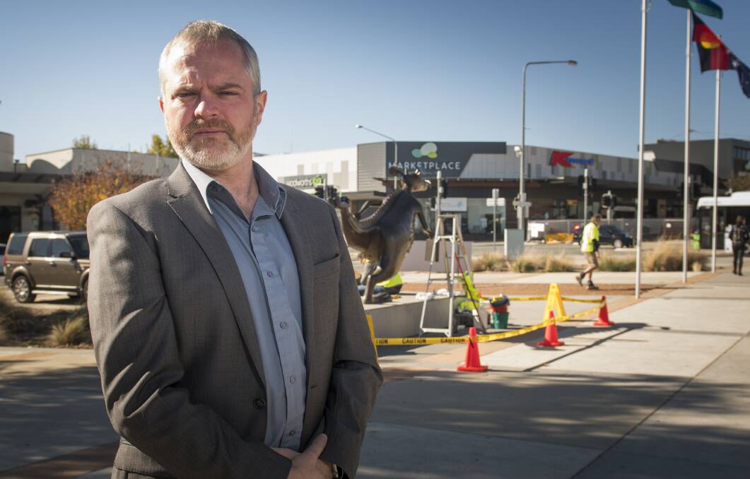 Celebrate Gungahlin festival committee member, David Pollard at the site where the festival would usually be held, which is surrounded by construction sites. Photo: Elesa Kurtz