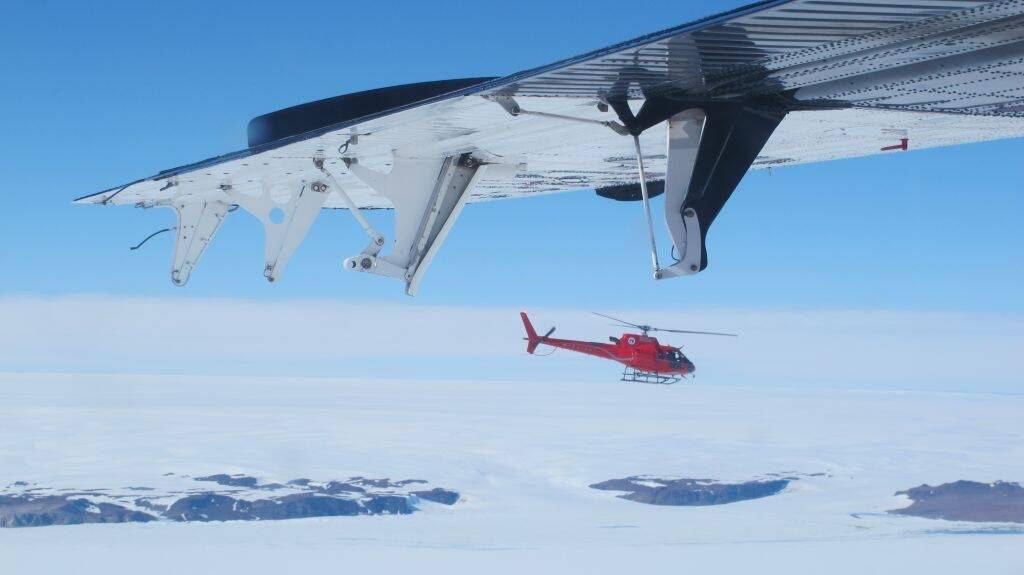David Wood's flies one of the squirrel helicopters in Antarctica. Photo: Supplied