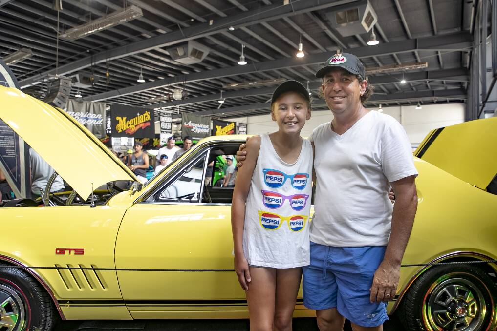 Adam Camilleri with his daughter Ashleigh, 12, and their immaculately restored 1968 HK Monaro GTS Photo: Sitthixay Ditthavong