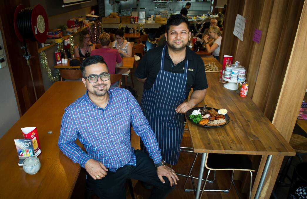 Kith and Nosh owners Karan Talwar and Kanav Modi expect to serve up a few of their big breakfasts on New Years Day to those with a sore head. Photo: Elesa Kurtz