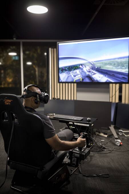 Lockheed Martin Australia systems integrator, Vikas Nayak, demonstrating the virtual technology in Canberra. Photo: Supplied
