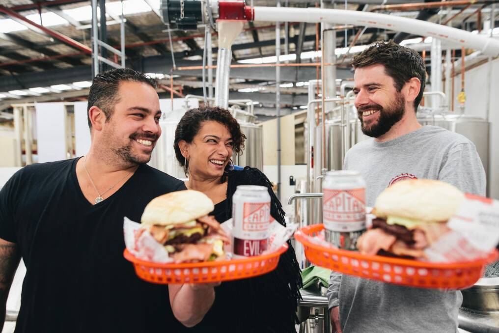 Brodburger's Sascha Brodbeck and Joelle Bou-Jaoude with Captial Brewing Co's Laurence Kain at the annoucement of the partnership between the two at Capital's new brewhouse. Photo: Rohan Thomson