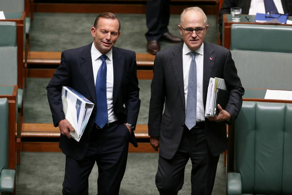 Then prime minister Tony Abbott and then communications minister Malcolm Turnbull arrive for Question Time at Parliament House in Canberra on Tuesday 3 March 2015. Photo: Alex Ellinghausen