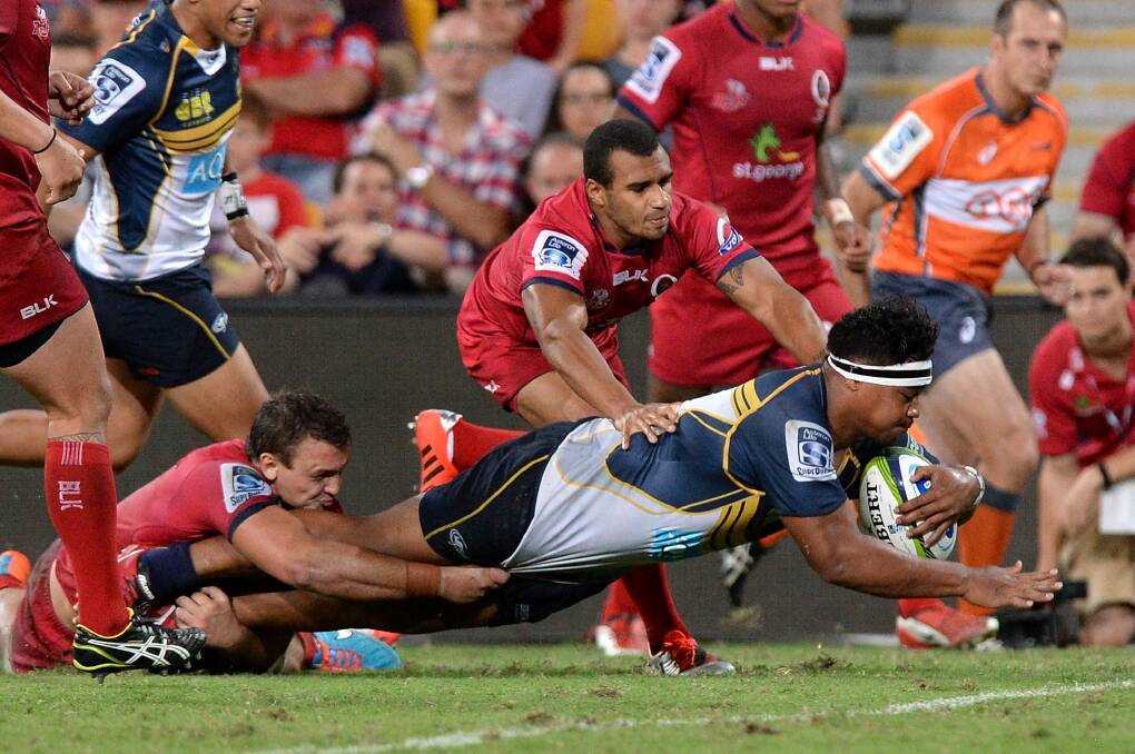 Ita Vaea of the Brumbies scores a try against the Reds. Photo: Getty Images