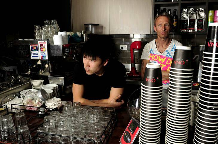 Cafe Garema owner Johnny Yang and chef Glenn Tranda in the recently closed Civic cafe. Photo: Stuart Walmsley