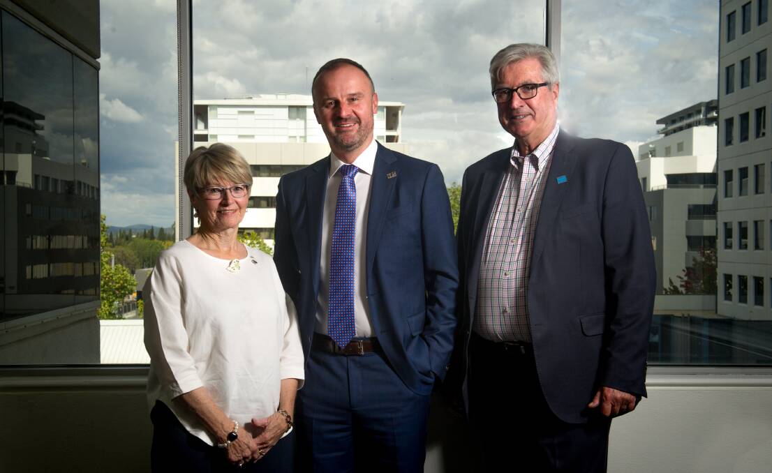 Chief Minister Andrew Barr (centre) at the charity's funding round announcement with the chair of the Hands Across Australia board, Diane Kargas Bray, and chief executive Peter Gordon. Photo: Elesa Kurtz Photo: Elesa Kurtz