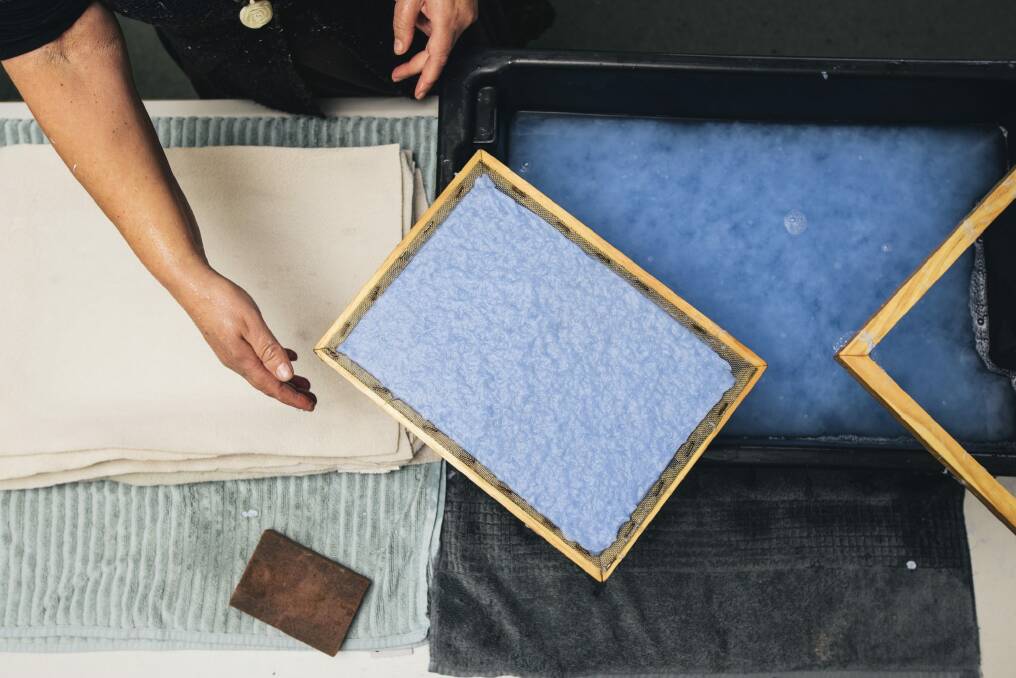 Artisan Sarah Sadler of Griffith making paper from old denim at Paperworks in Watson.  Photo: Rohan Thomson