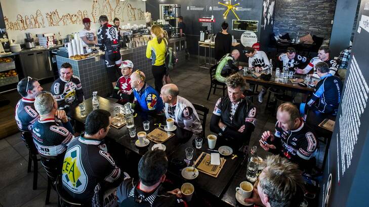 Cyclists drink morning coffees at Two Before Ten in the city. Photo: Rohan Thomson