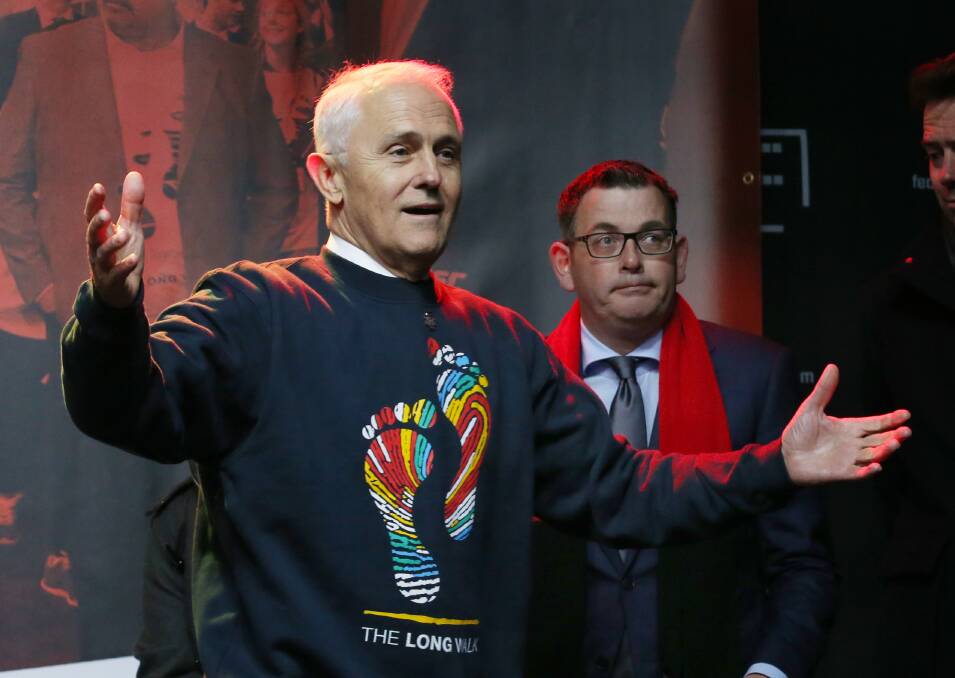 Prime Minister Malcolm Turnbull and Victorian Premier Daniel Andrews arrive for the Long Walk in Melbourne. Photo: AAP
