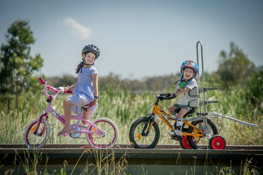 Three-year-old Beau Hodder will be keeping up with his sister Tilly, 7, on his new bike. Photo: Karleen Minney