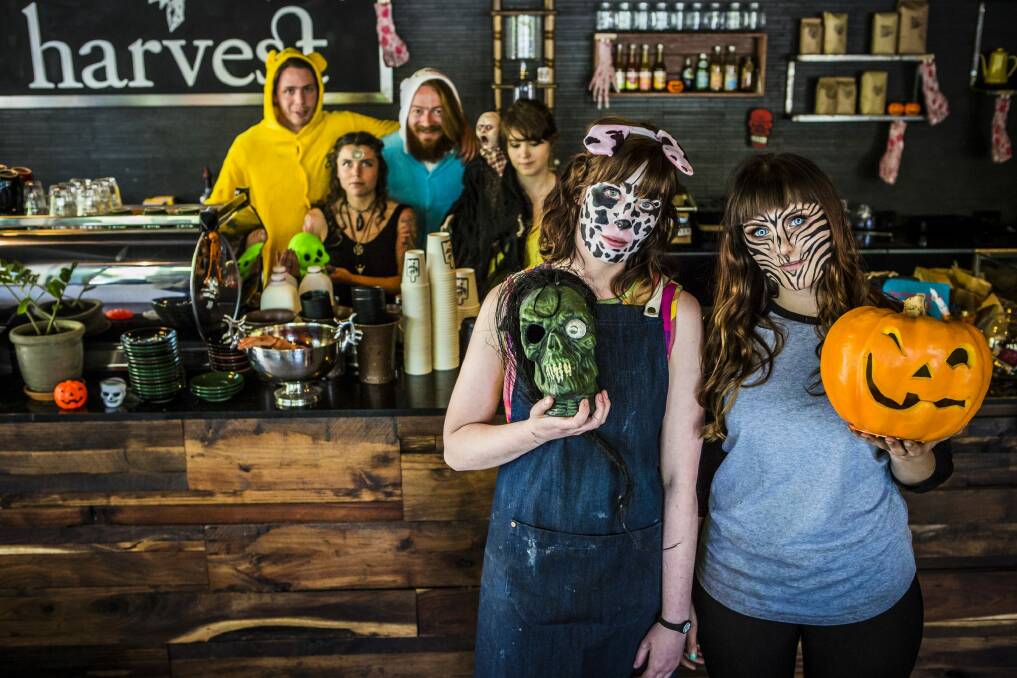 Sam Ryrie, Tenzin Szabo, Leandra Martinello, Kathleen Quinn and Hannah Campbell with Rebecca Bailey from Harvest Coffee all dressed up for Halloween. Photo: Jamila Toderas