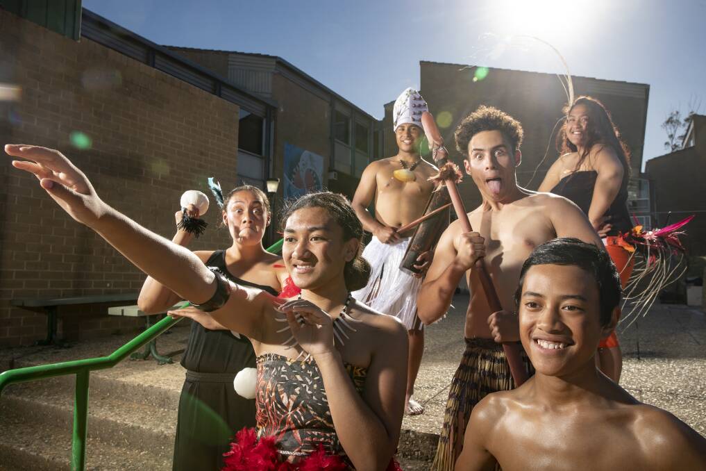 Members of Polynesian dance group Island Pride rehearse for Polyfest at Karabar High School. L-R: Zali Andrews (Maori), Edally Eteuati (Samoan), Tearoa Tai'-Maine (Cook Islands), Elijah Emanuel (Maori), Scott Dolvin (Samoan), and Phillinah Utia (Cook Islands).  Photo: Sitthixay Ditthavong