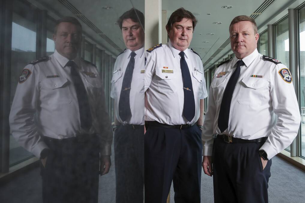  ACT Ambulance Service Chief Officer Howard Wren and ACT Emergency Services Agency Commissioner Dominic Lane gave evidence at a Senate inquiry on Wednesday.  Photo: Alex Ellinghausen