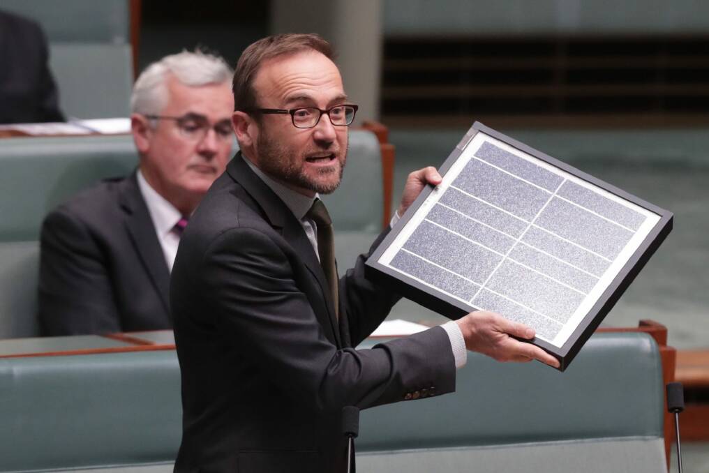 Greens MP Adam Bandt during question time at Parliament House. He requested a costing of meeting the Paris agreement under the government's current policy. Photo: Andrew Meares Photo: Andrew Meares
