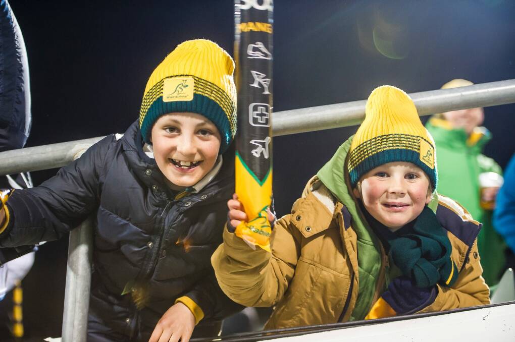 Archie Fergusson, 9, and Oliver Paul, 6, came from Cooma for the game. Photo: Sitthixay Ditthavong