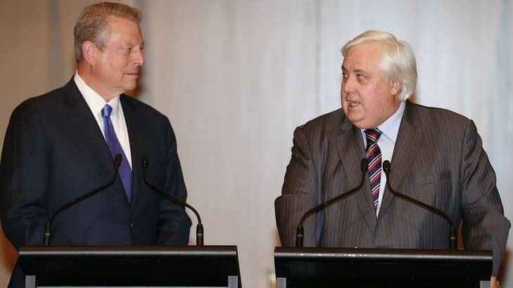 Clive Palmer, pictured with former US vice president Al Gore last week, says all senators in the Palmer United Party support the renewable energy target unchanged. Photo: Alex Ellinghausen