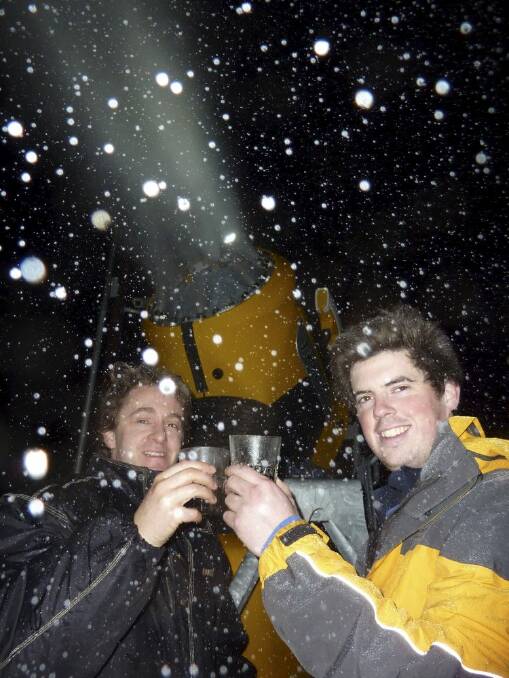 Sparkling: Ben Mock and Dane Liepens celebrate their snow-making efforts at Corin Forest. Photo: Tim the Yowie Man