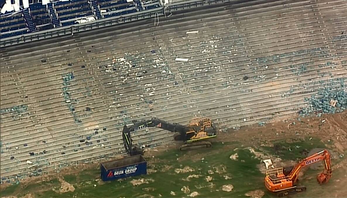 So-called soft demolition works are under way inside the stadium, where thousands of seats have been ripped out.  Photo: Nine News