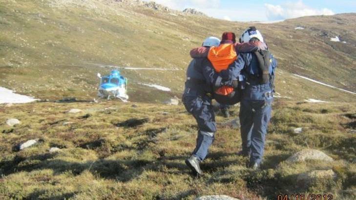 Bruce Wharrie and Marg Hayes, of Jindabyne, were about 1.5 kilometres south of Mount Kosciuszko Mr Wharrie fell forward onto his face, breaking his leg. Photo: Snowy Hydro Southcare
