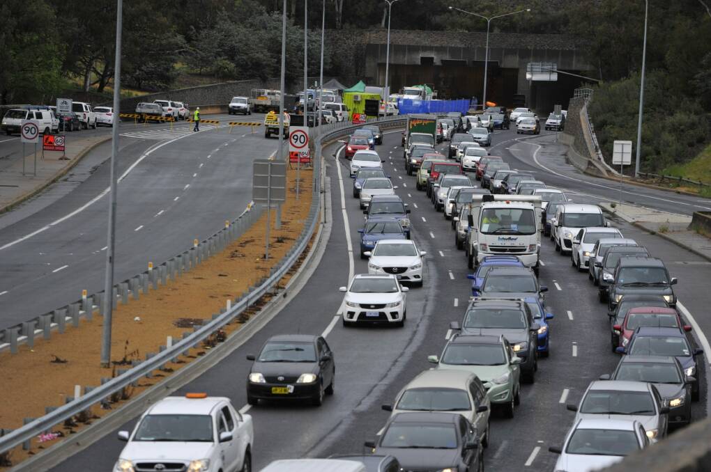 Heavy traffic on Parkes Way after the Acton tunnel crash in 2015: Infrastructure Australia says the ACT needs to build public transport capacity east to west. Photo: Jay Cronan Photo: Jay Cronan
