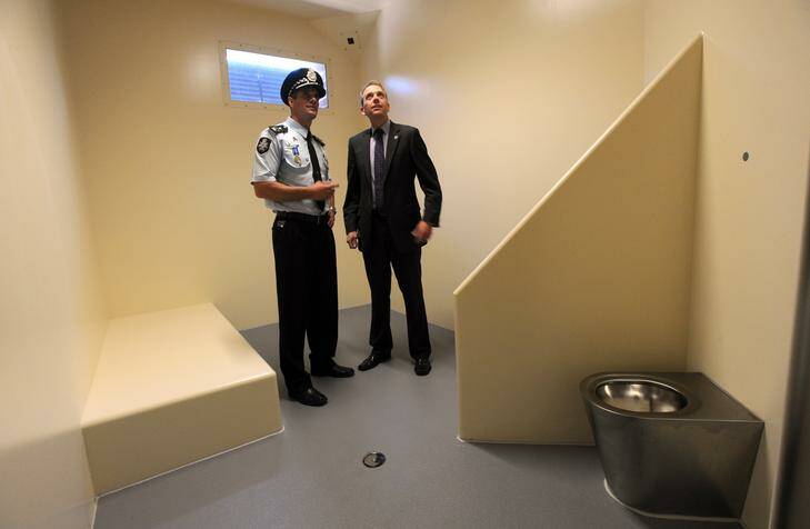 Touring the ACT Watch house are ACT Chief Police Officer, Roman Quaedvlieg, left and ACT Police Minister, Simon Corbell.