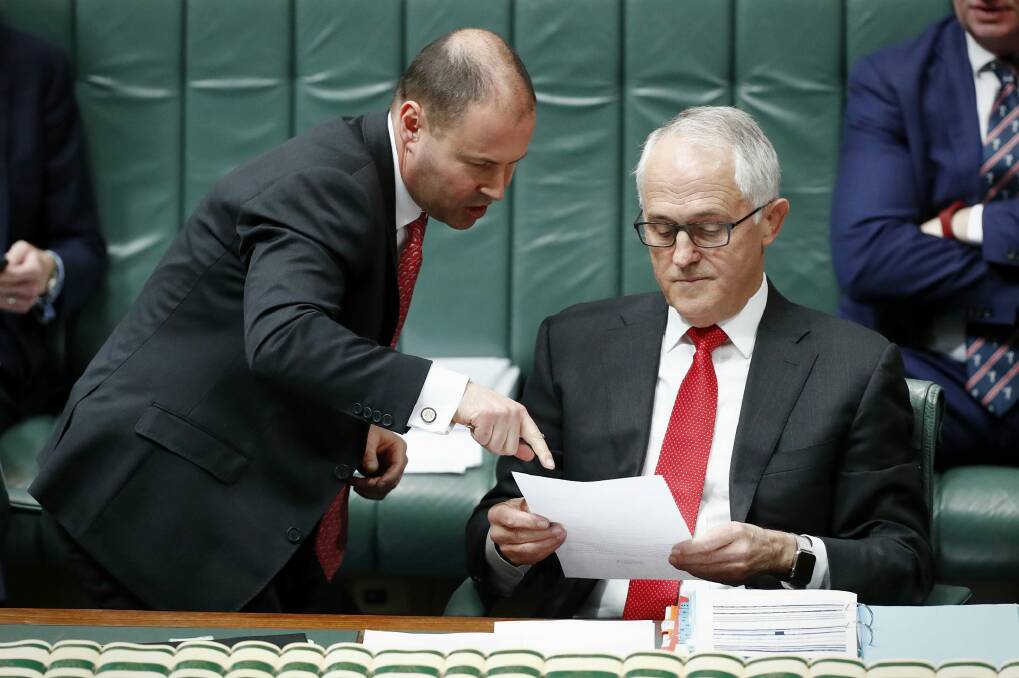 Josh Frydenberg and Malcolm Turnbull in Parliament on Tuesday. Photo: Alex Ellinghausen
