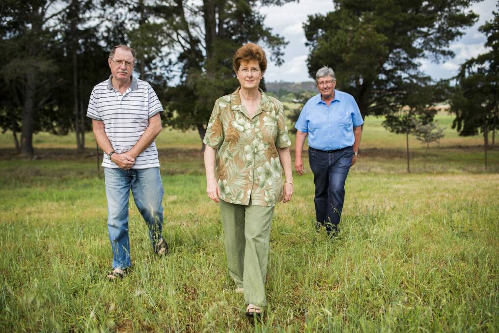 David Carroll, Roslyn Chan and John Dash oppose plans for the CSIRO Ginninderra Experiment Station to be rezoned. Photo: Rohan Thomson