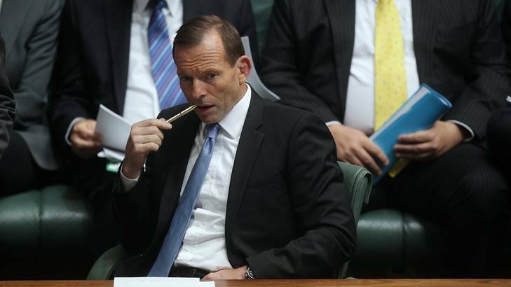 Is the real Tony Abbott straining under the self-imposed chains of leadership? Photo: Alex Ellinghausen