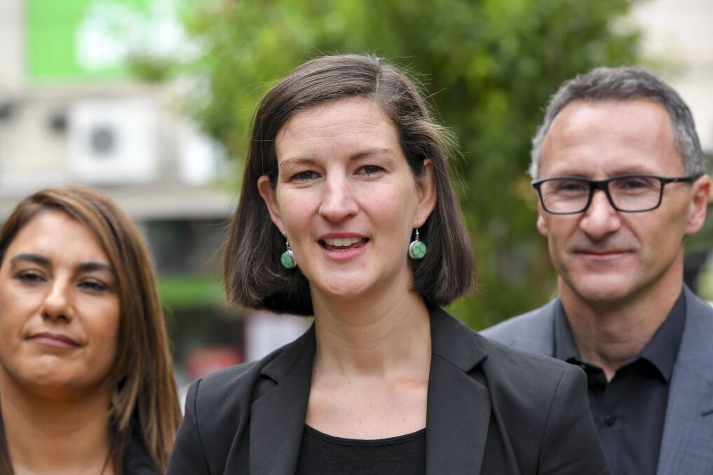 Melbourne MP Ellen Sandell, centre, with Northcote MP Lidia Thorpe and Federal Greens leader Richard Di Natale.  Photo: Eddie Jim