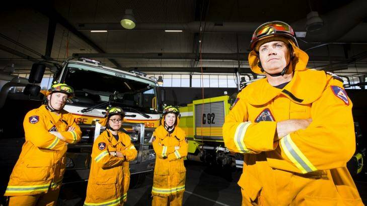 New help: Canberra's new generation of firefighters, from left, Brendan van der Vlist, 30, Jane Hung, 33, and Andrew Lomas, 23, with their Gungahlin rural fire brigade captain Simon Butt, 46.  Photo: Matt Bedford