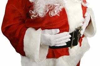 Queensland's shopping centre Santas must be cleared to work with children before children can sit on their laps, child safety advocates argue. Photo: File photo